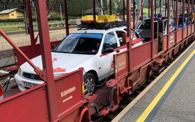 wacky racers rally car on train
